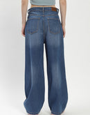 Madame Shanaya Kapoor High-Waisted Flared Ripped Mid Blue Jeans